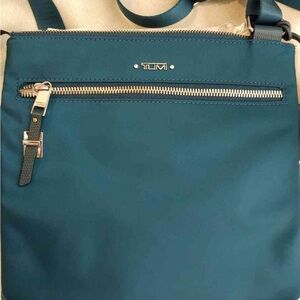 TUMI Blue Crossbody Bag with Silver Accents